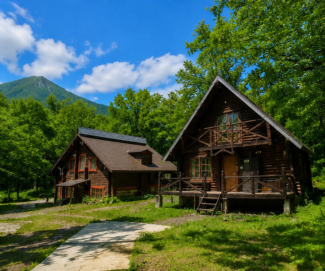 GreenBell log house surrounded by greenery